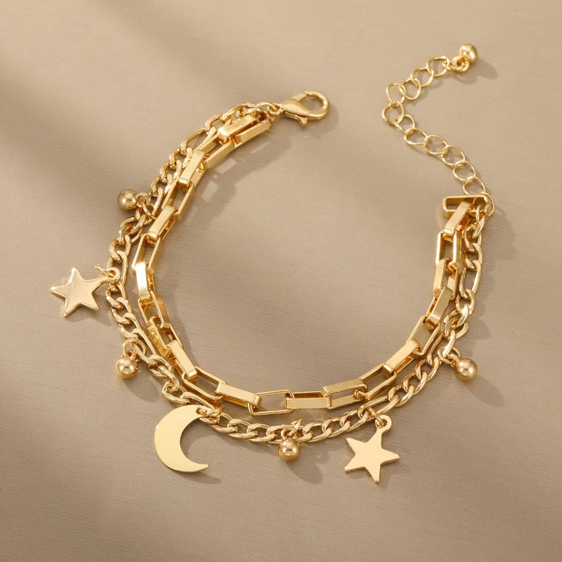 Pulsera luxe con estrella y luna