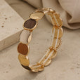 Pulsera artesanal elástica en dorado