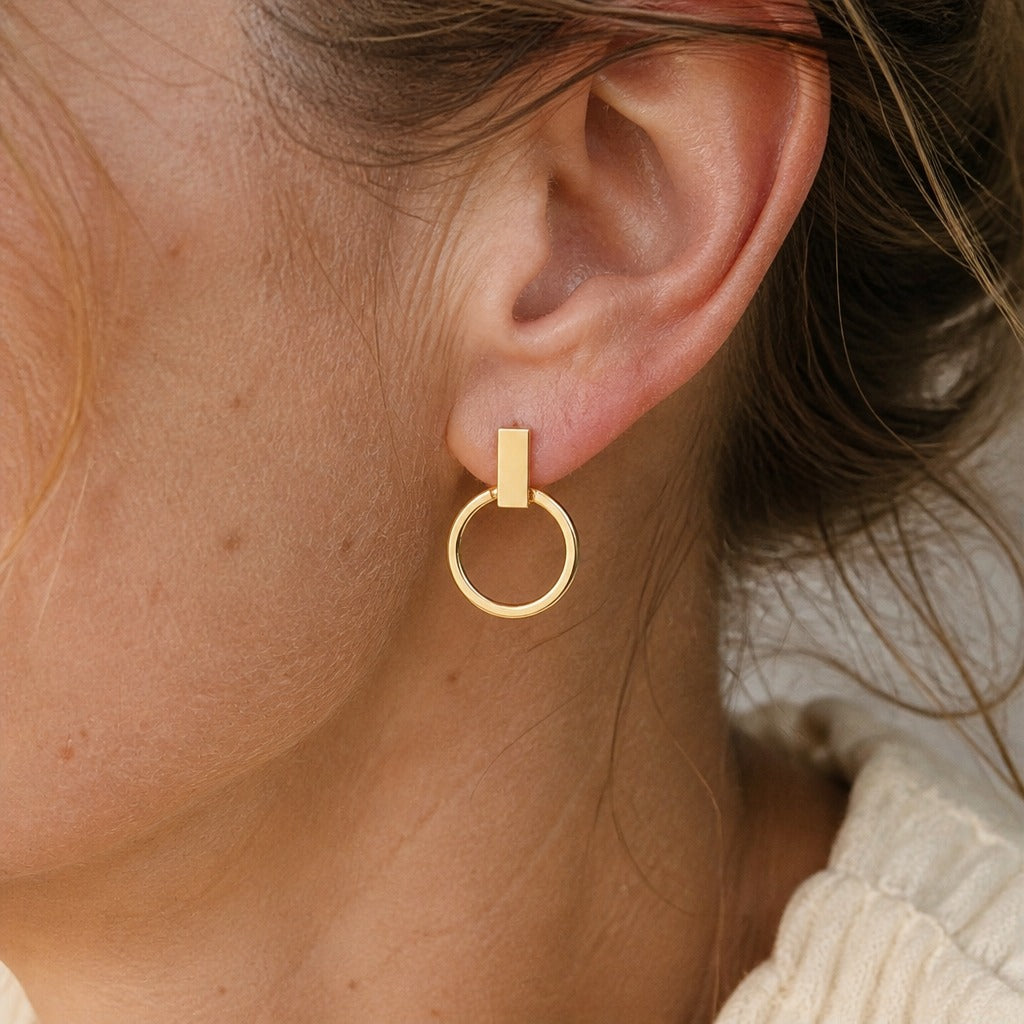 Pendientes de botón redondos y elegantes