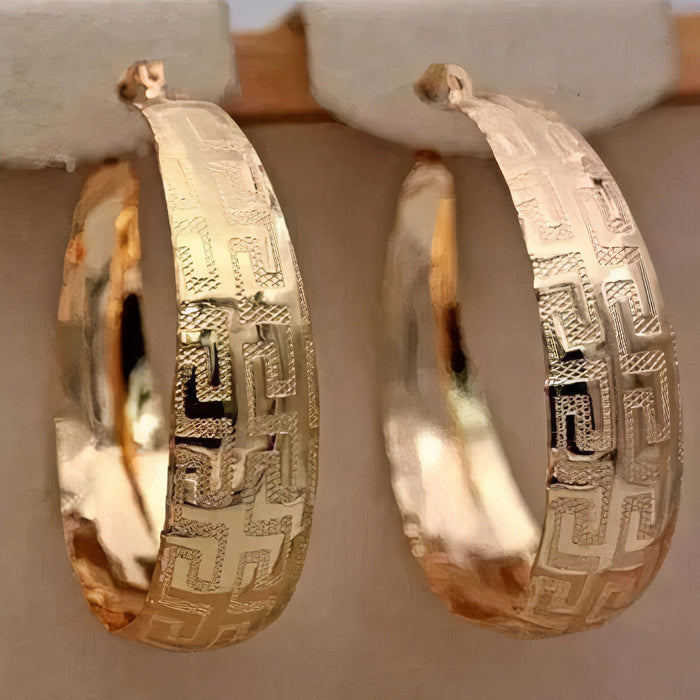 Pendientes dorados llamativos Heirloom
