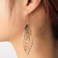 Pendientes largos de resina con alas de mariposa