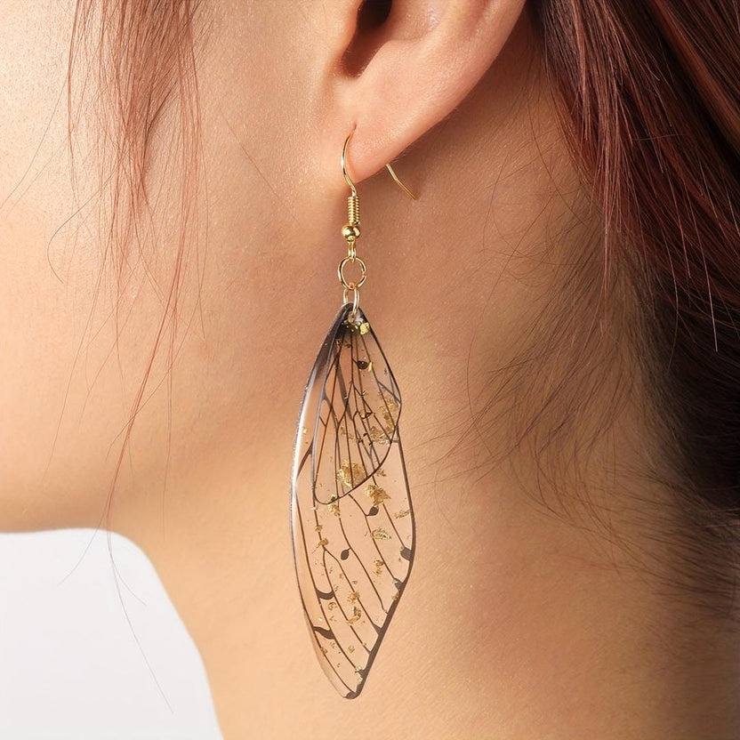 Pendientes largos de resina con alas de mariposa