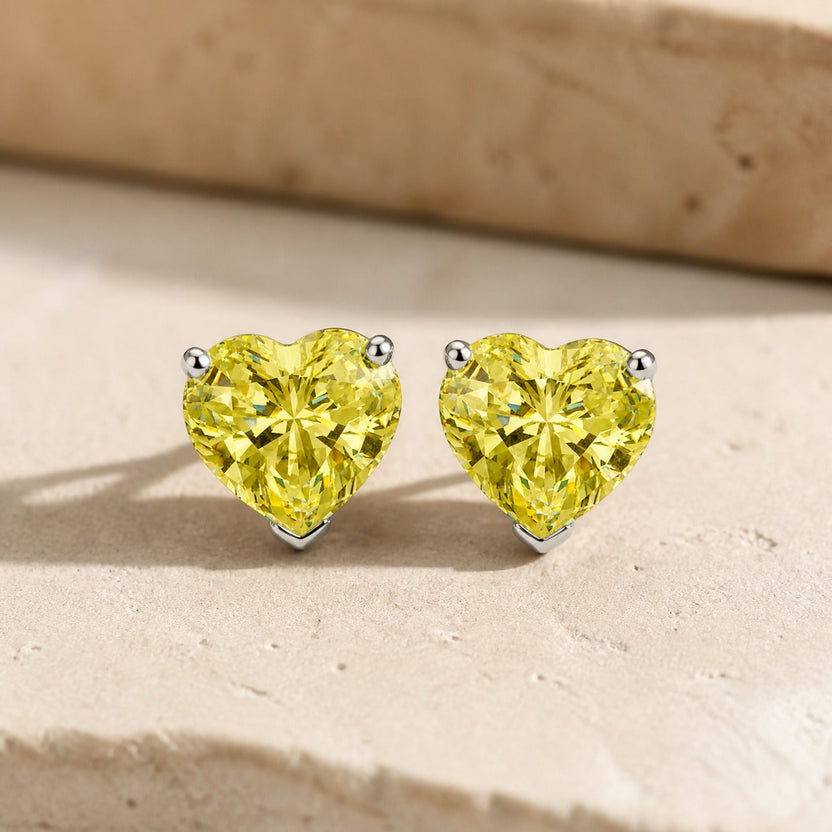 Pendientes de corazón amarillos deslumbrantes