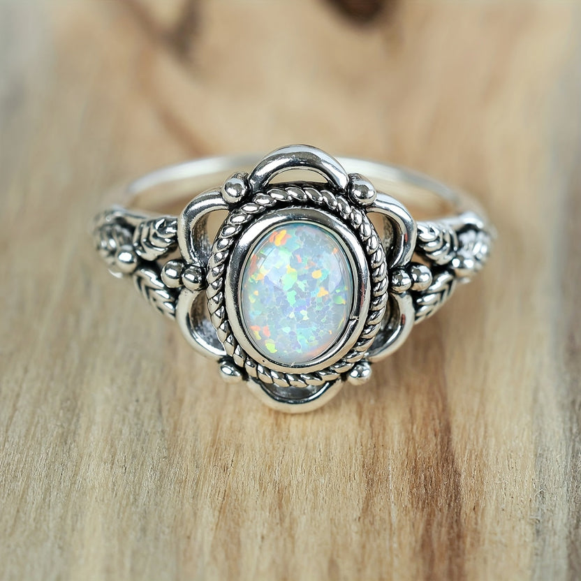 Anillo elegante de ópalo con hoja