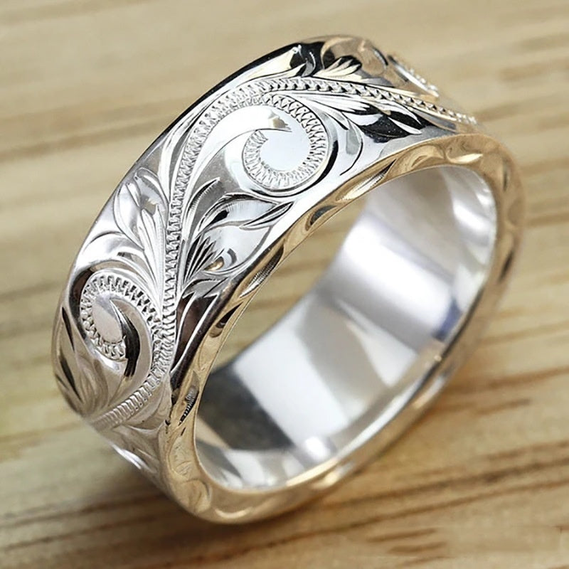 Exquisito anillo de hoja tallada a mano