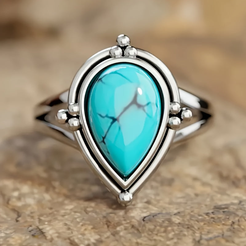 Anillo de bisutería brillante con gota