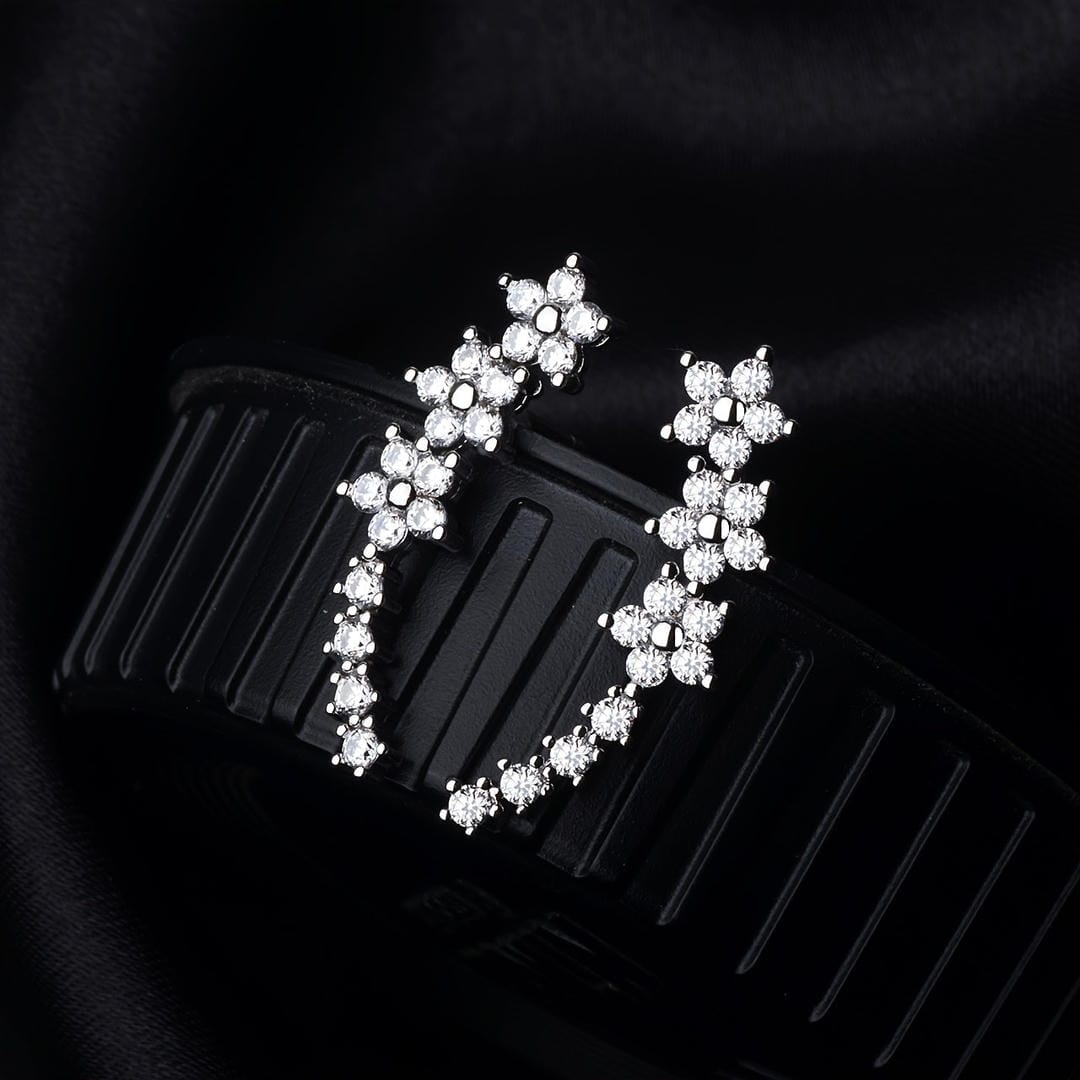 Pendientes llamativos de flor con brillo