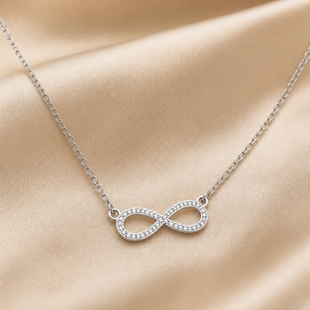 Collar colgante infinito de circonita y oro blanco