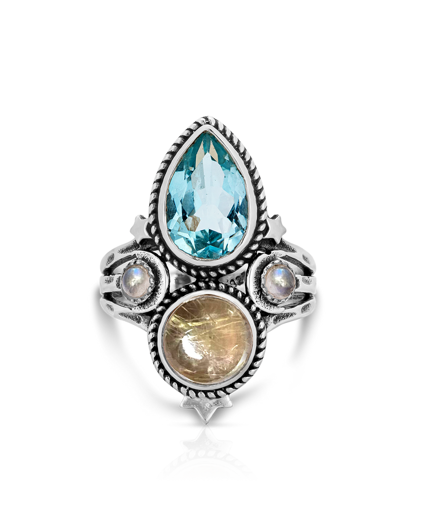 Anillo celestial de topacio azul