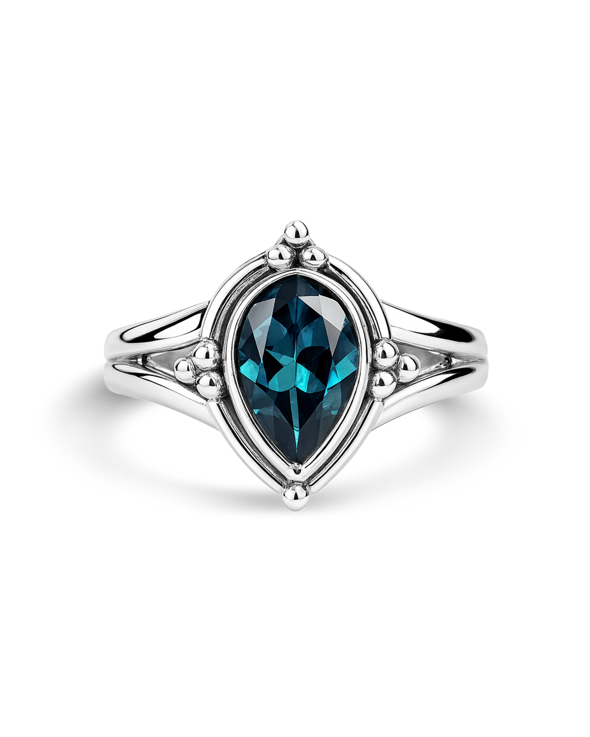 Anillo de topacio azul en forma de gota