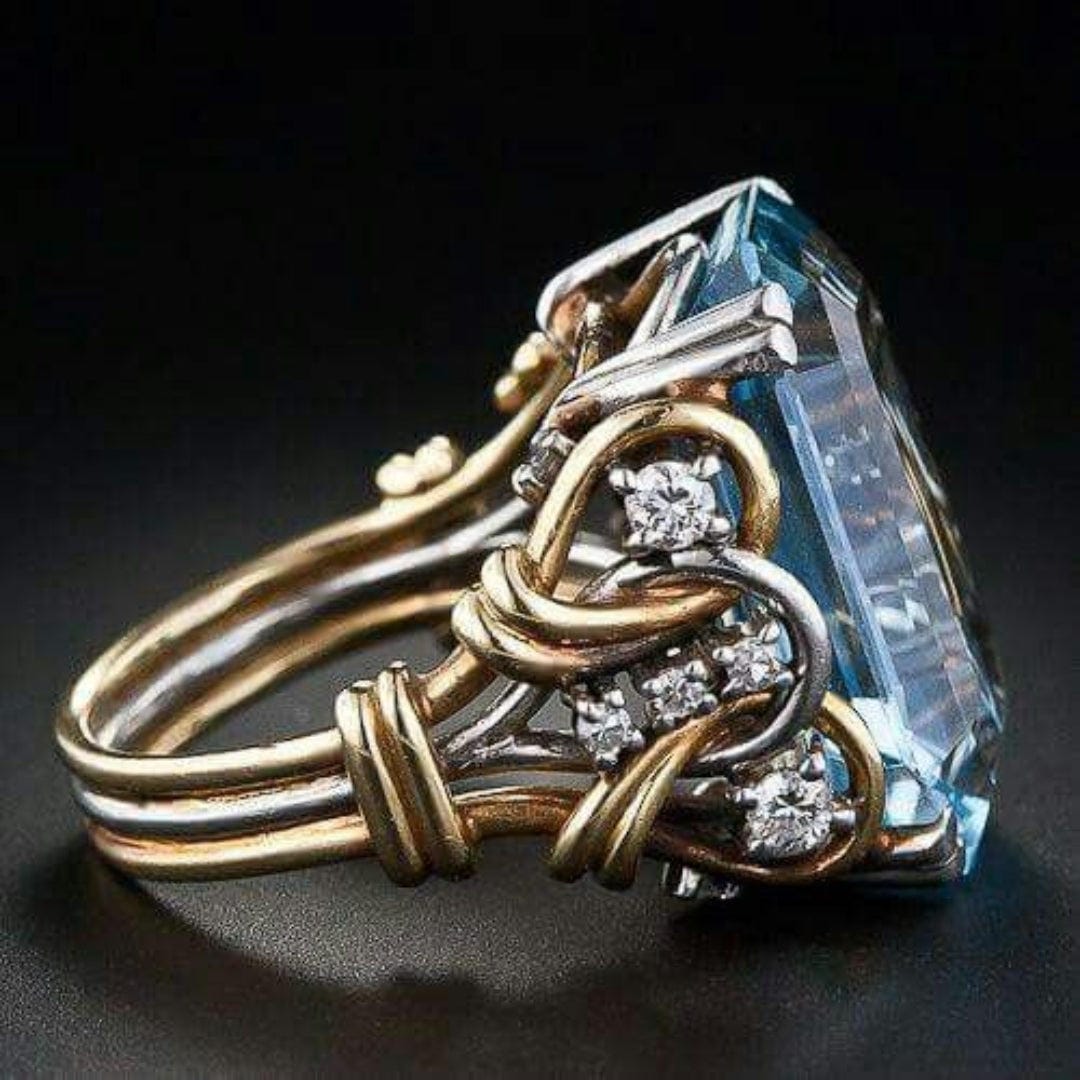 Anillo vintage de oro en capas con circonita azul