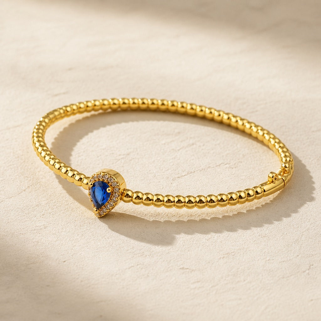 Pulsera manguito dorada de circonita con cristal – imagen 2