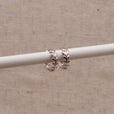 Aros huggie de laurel de plata