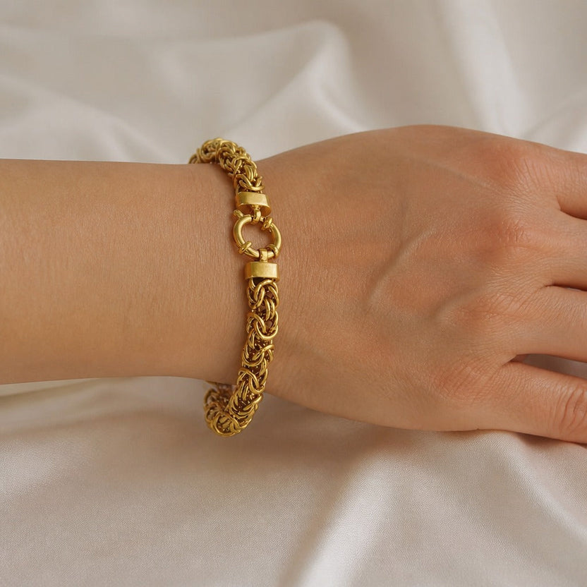 Pulsera dorada noble trenzada
