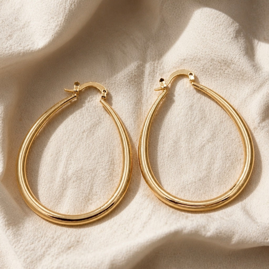 Pendientes de aro dorados majestuosos