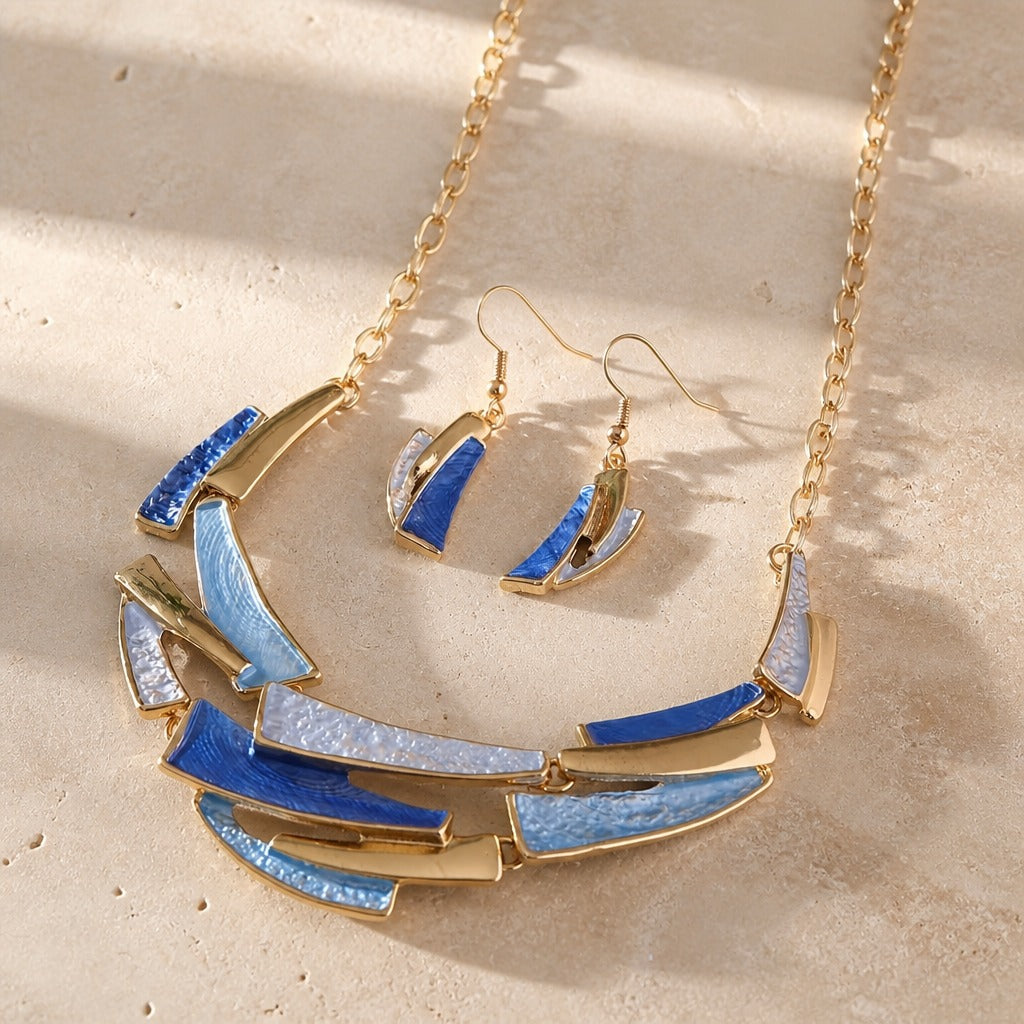 Conjunto de collar y pendientes con eslabones geométricos