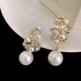 Pendientes elegantes de flor con perla – imagen 2