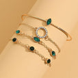 Set de pulseras de cristal esmeralda y oro