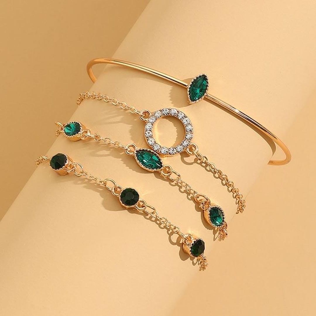 Set de pulseras de cristal esmeralda y oro