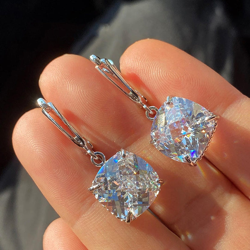 Pendientes colgantes de circonita en oro blanco
