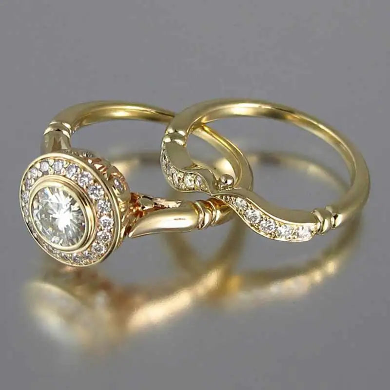 Conjunto clásico dorado de anillos de élite