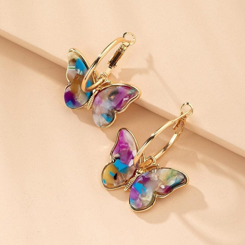 Pendientes aro dorados con mariposa