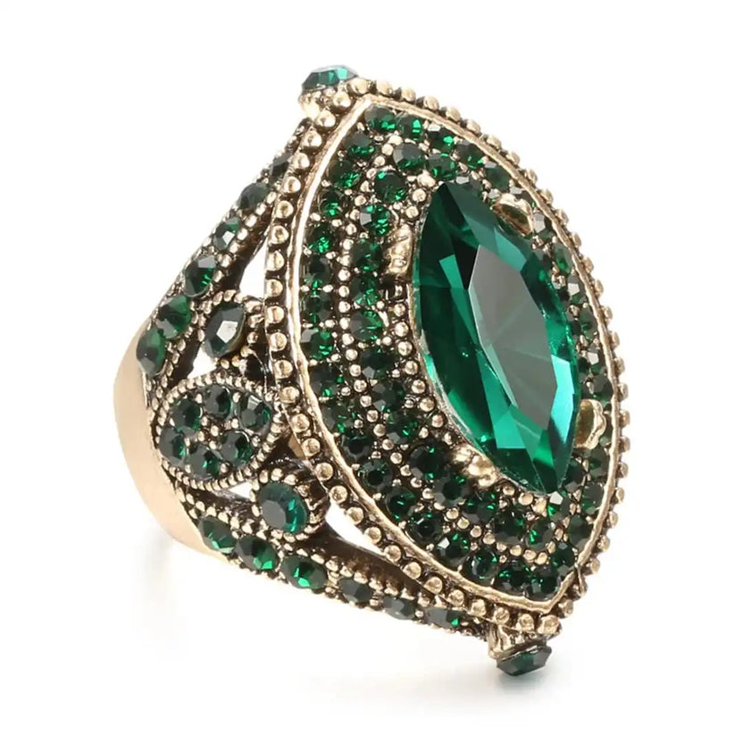 Anillo vintage dorado con cristal marquesa