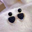 Pendientes de corazón negro