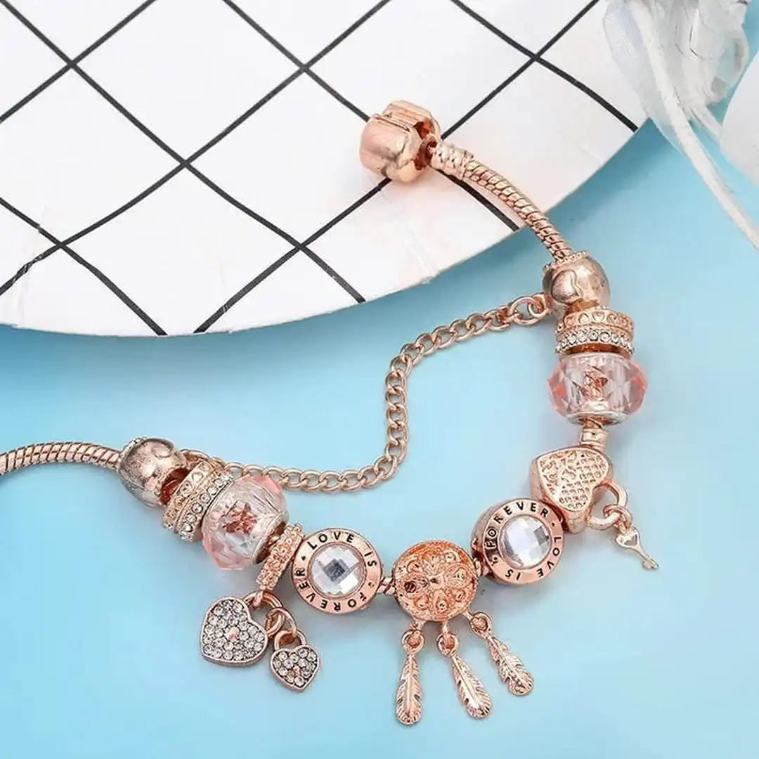 Pulsera atrapasueños de rosa con dijes incluidos – imagen 3