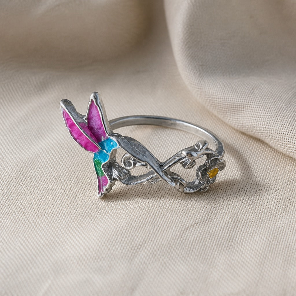 Anillo de plata eternity con colibrí y flores
