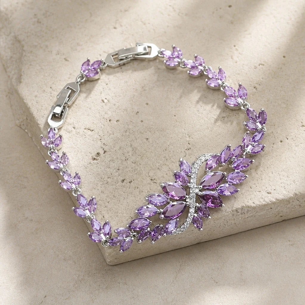 Pulsera de plata Infinito con hoja — Carmen, Lucía & Rocío