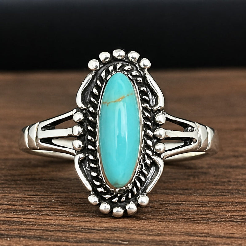 Anillo ovalado lustroso de turquesa