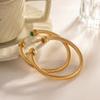 Brazalete dorado con gemas – imagen 7
