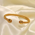 Brazalete dorado con gemas – imagen 8