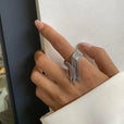 Anillo radiante con borla dorada – imagen 6