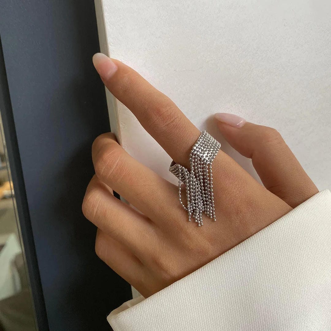 Anillo radiante con borla dorada – imagen 6