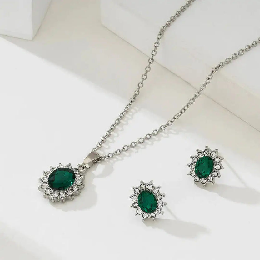Set de plata con esmeralda y sol radiante