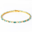 Pulsera de circonita dorada con turquesa