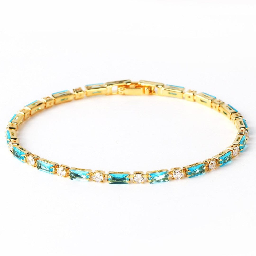Pulsera de circonita dorada con turquesa