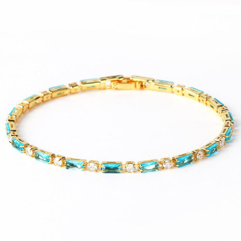 Pulsera de circonita dorada con turquesa