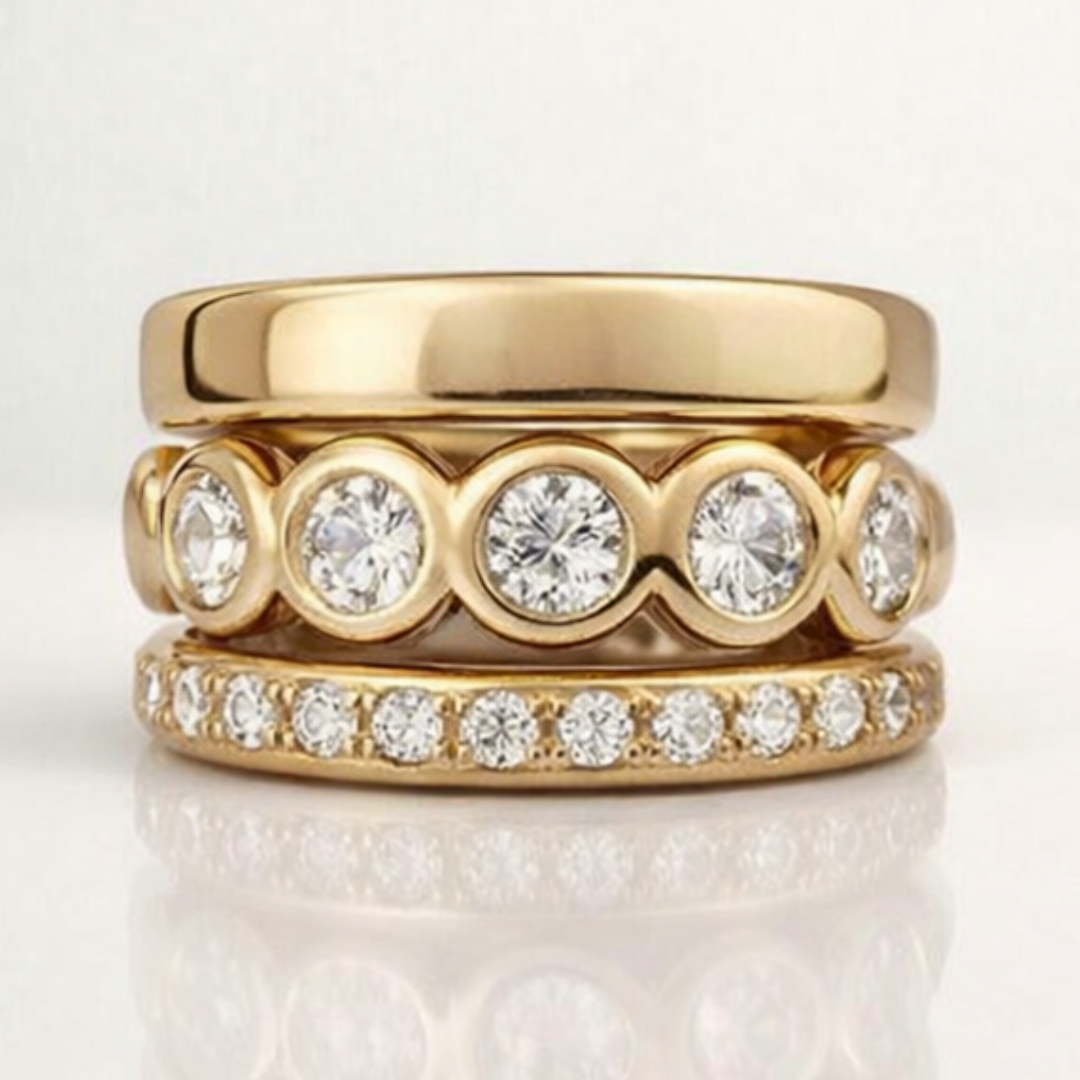 Anillo de circonita y oro forjado