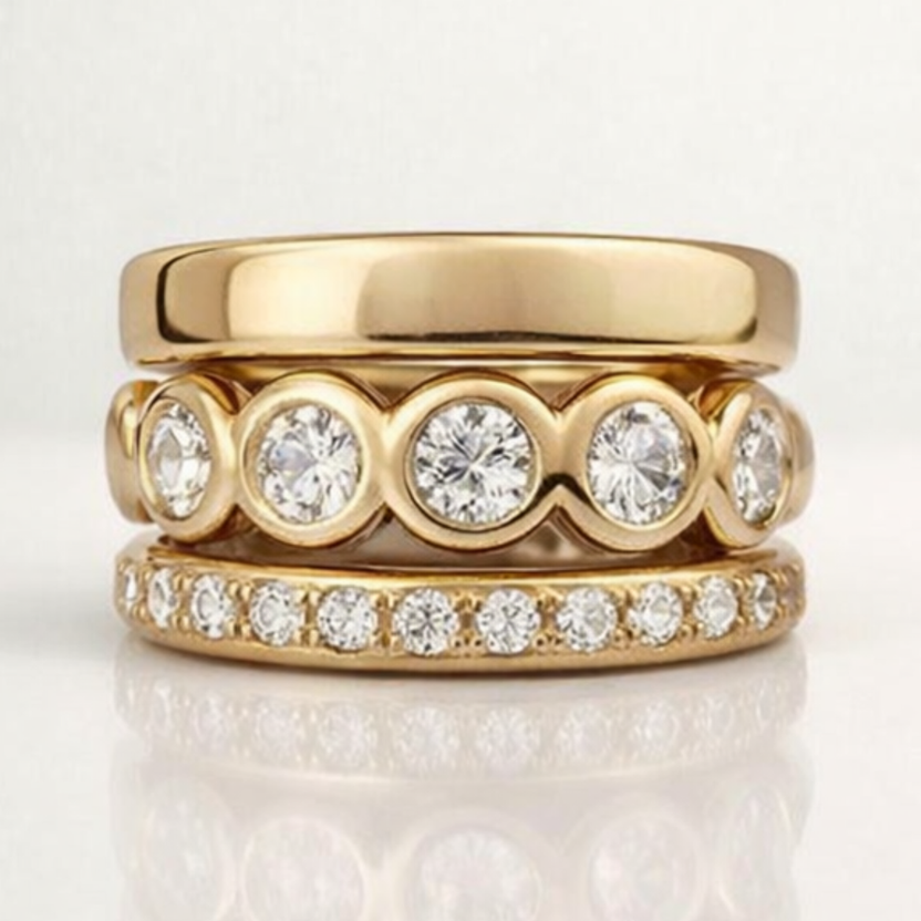 Anillo de circonita y oro forjado