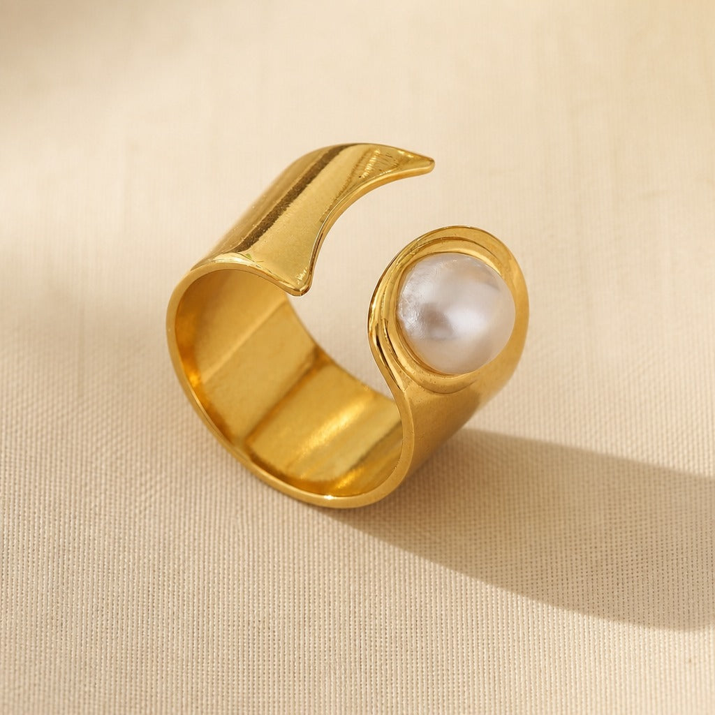 Anillo abierto de perla y oro