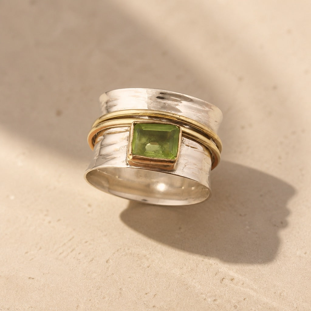 Anillo bicolor de circonita peridoto