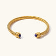 Brazalete dorado con gemas
