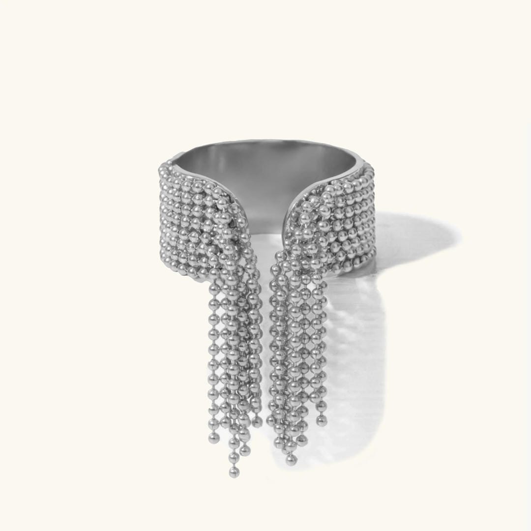 Anillo radiante con borla dorada – imagen 2