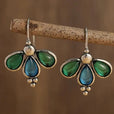 Pendientes de gota azul con alas esmeralda