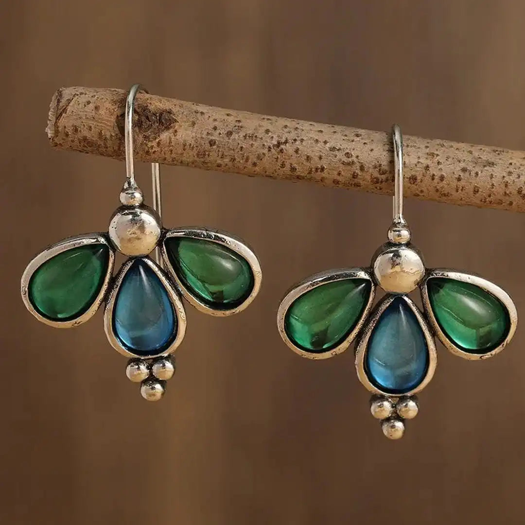 Pendientes de gota azul con alas esmeralda