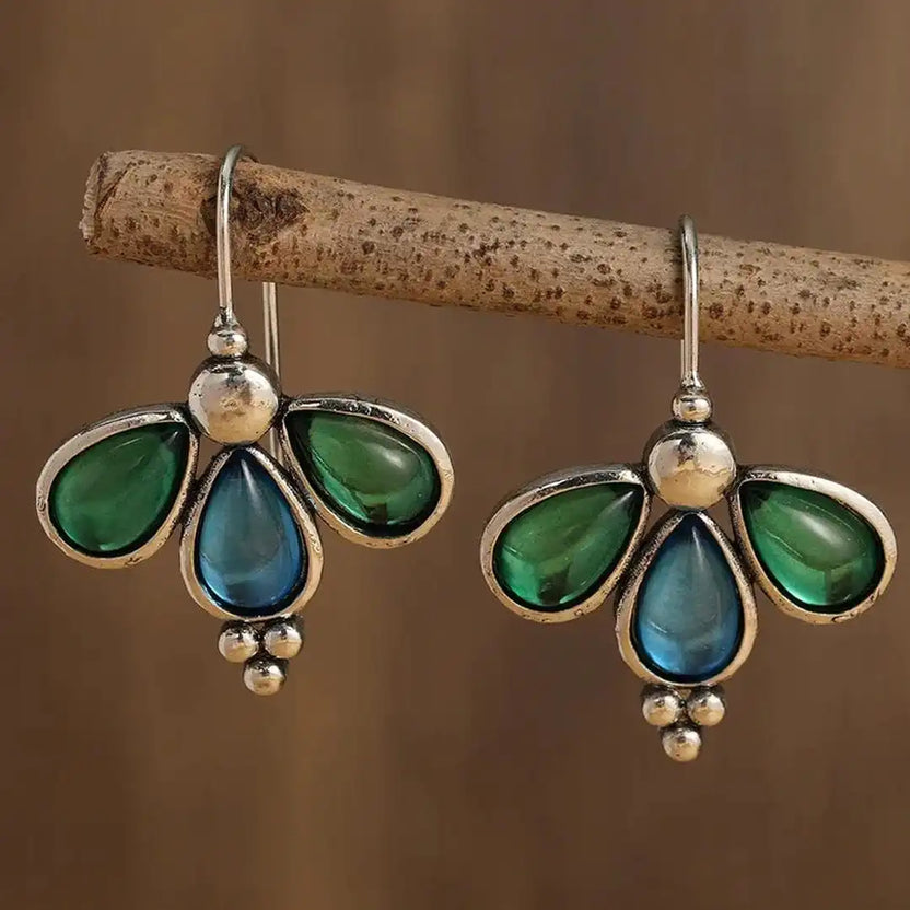 Pendientes de gota azul con alas esmeralda