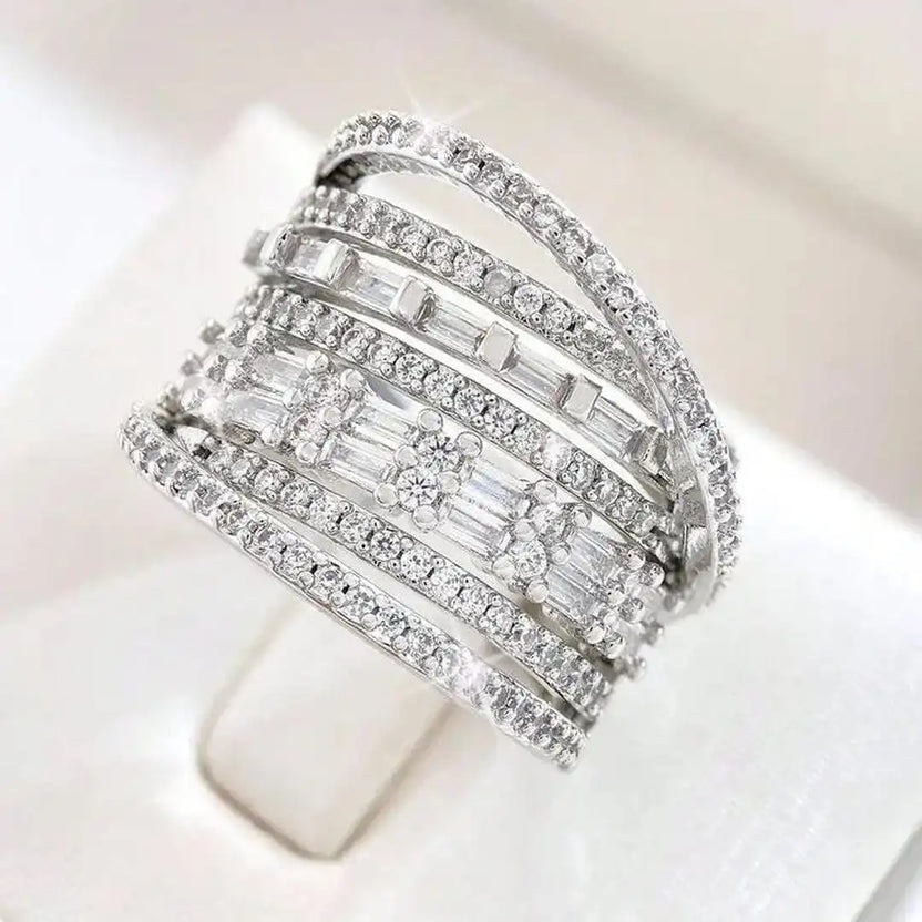 Anillo exquisito de plata multicapa